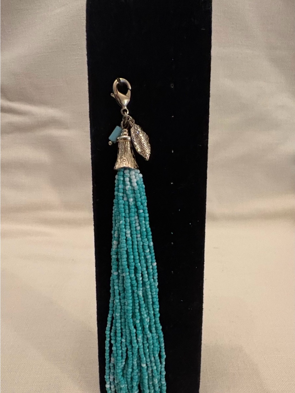 Turquoise Beaded Tassel Charm with Silver Leaf